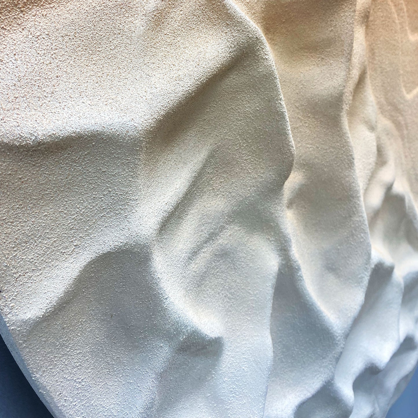 Sunlit Peaks Round Carved Relief