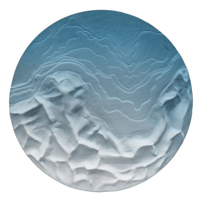 Sunlit Peaks Round Carved Relief